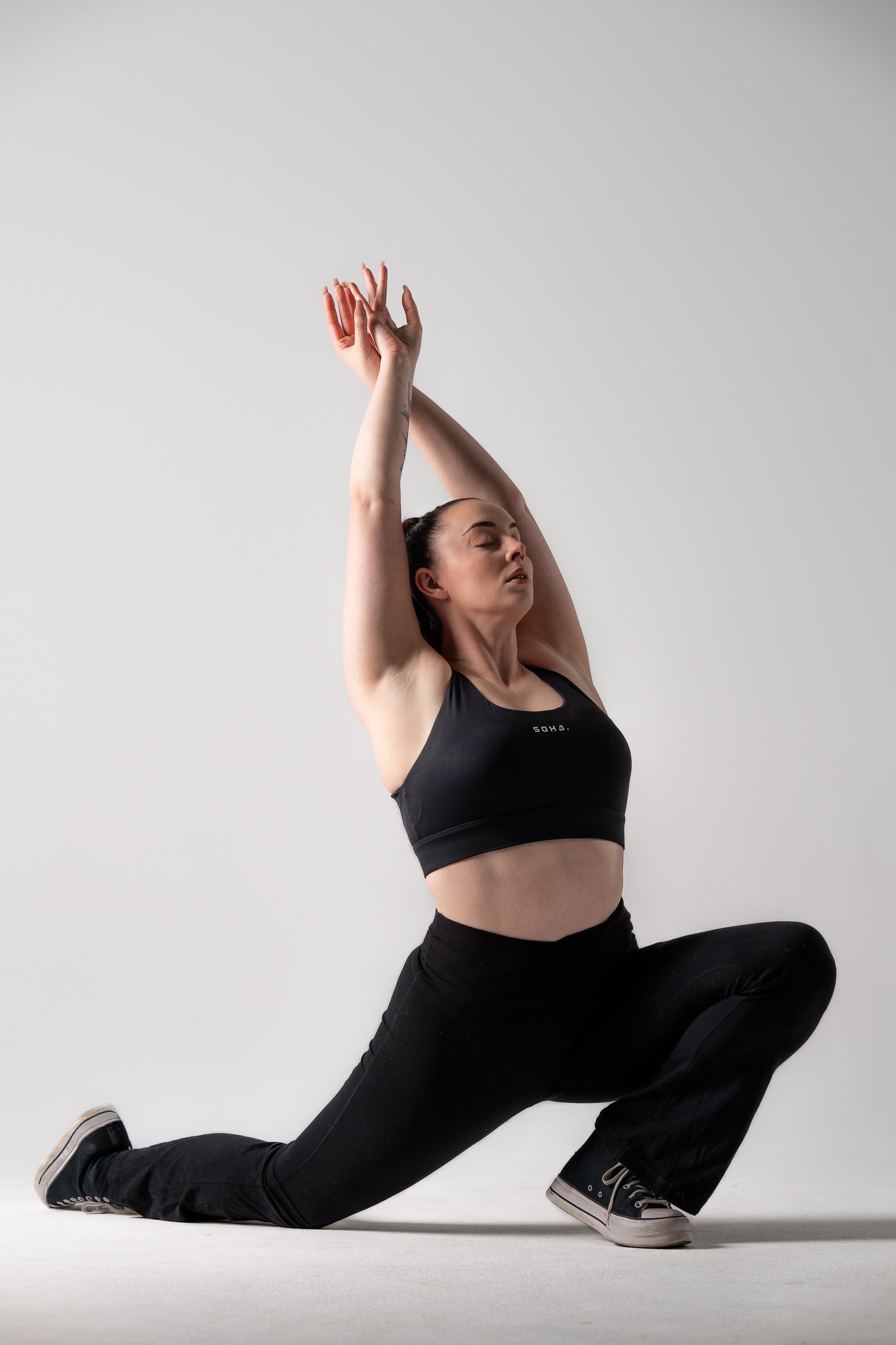 Soha Signature Support Bra in Midnight Black - front view showing hidden support structure and power mesh design