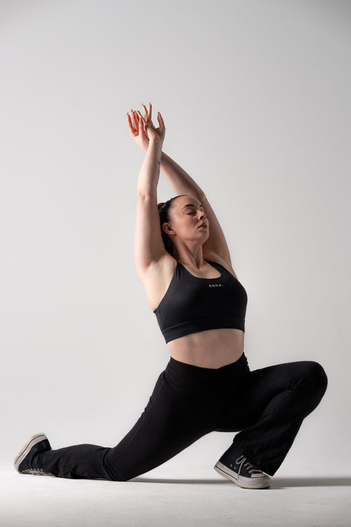 Soha Signature Support Bra in Midnight Black - front view showing hidden support structure and power mesh design