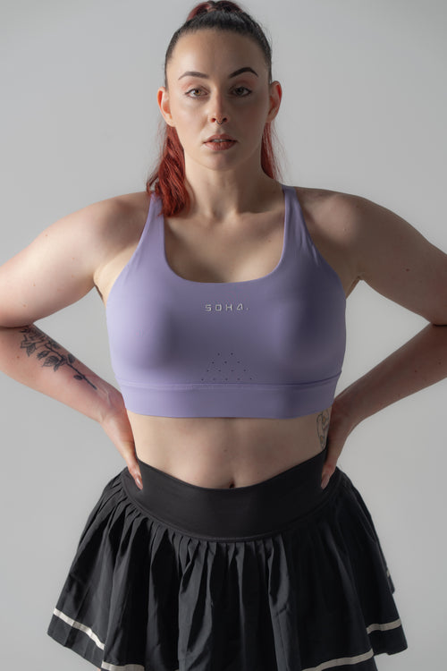 Woman wearing Soha Signature Support Bra in Deep Amethyst - side angle showing lift and support